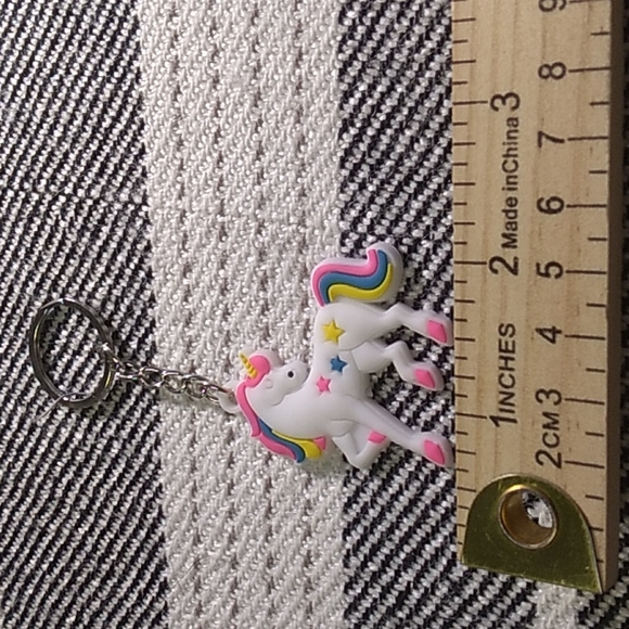 8 Unicorn Keychain's cute for any occasion. White, pink, purple, yellow - Picture 9 of 15